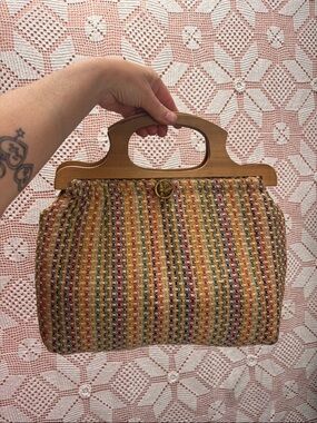 Vintage Tapestry Handbag w/ Wooden Handle
Multicolor woven tapestry
